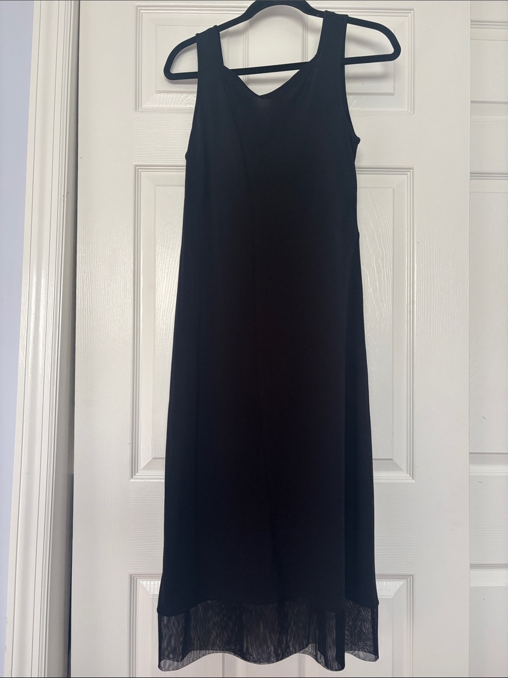 BCBG Sleek Black Sleeveless Midi Dress with transparent net Trim